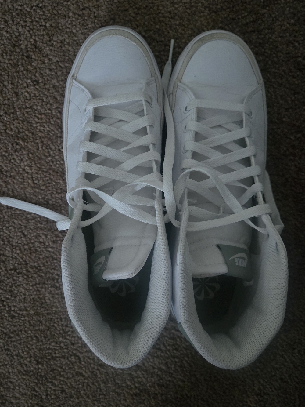 Nike White High-Top Sneakers with Subtle Gray Accents
